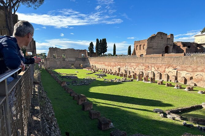 Ancient Rome Discovery: Colosseum, Forum, Palatine Guided Tour - Entering the Colosseum from the first tier