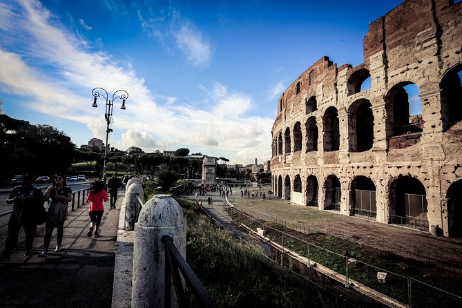 Ancient Rome Guided Tour: Colosseum, Forum and Palatine & Pick Up - Walking the Via Sacra and Roman Forum