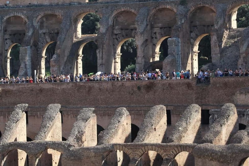 Colosseum, Forum & Palatine Hill Guided Walking tour - Entering the Colosseum with a guide