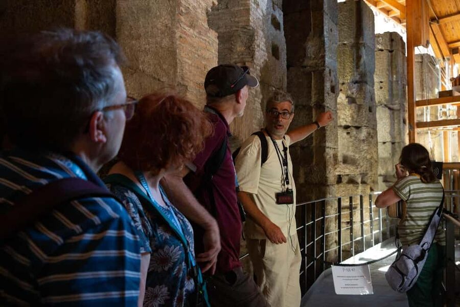 Colosseum Special Access Tour, with Ancient Temples & Tombs - Entering through the Gladiators’ Gate