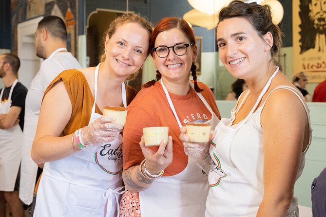 Fettuccine, Ravioli and Tiramisu Pasta Making in Rome - Making fettuccine from flour and eggs