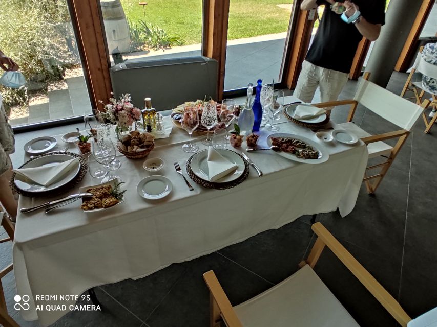 From Civitavecchia: Tuscany-Latium Wine Tour with Tastings - Second winery: comparing a different style of bottle