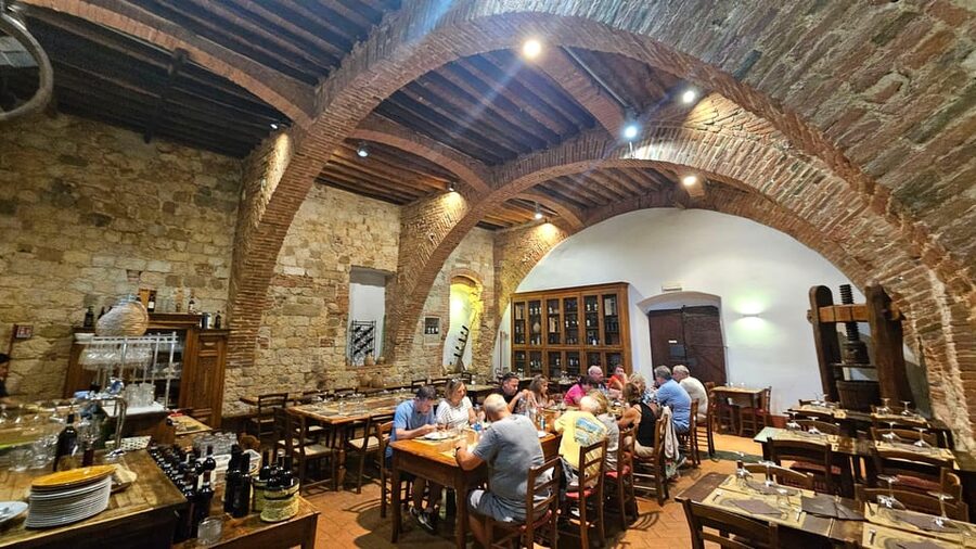 From Rome: Tuscany, Montepulciano Tour with Wine & Lunch - A medieval cellar beneath Montepulciano