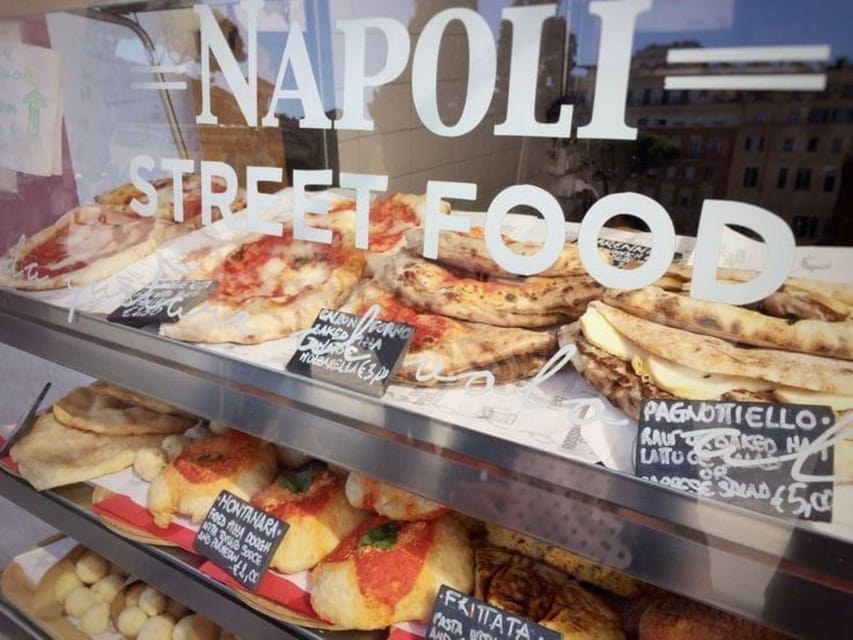 Napoli street food walking tour - Entering the Quartieri Spagnoli with tarallo