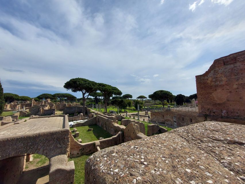 Ostia Antica: Archaeological Guided Private Tour - Piazzale delle Corporazioni and the working city