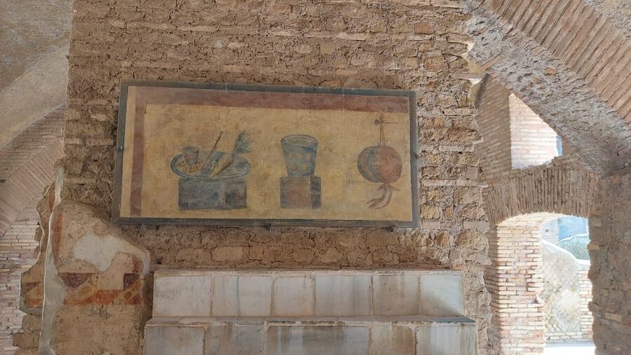 Ostia Antica: Archaeological Guided Private Tour - Apartment blocks, villas, shops, and public toilets