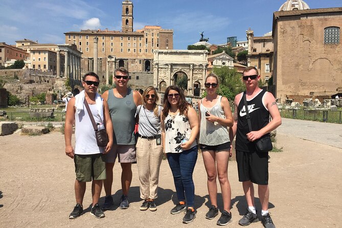 Private Colosseum and Roman Forum Tour with Arena Floor Access - Walking through the Roman Forum