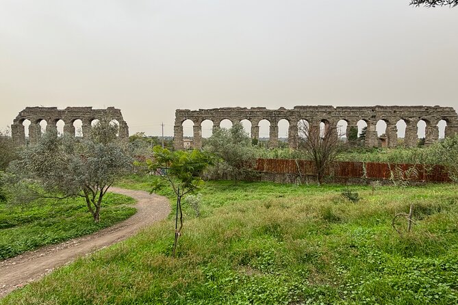 Private E-bike tour of Appian way, Aqueduct & catacombs with food - Caffarella Valley adds a local pause