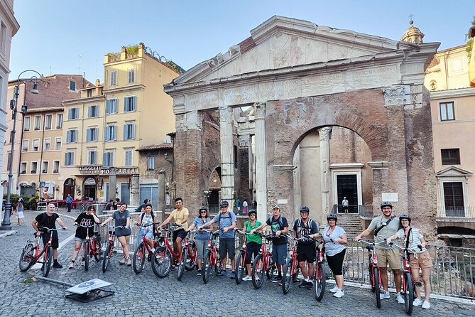 Private Sacred Relics Jubilee Bike Tour - Tossing a coin at Trevi Fountain