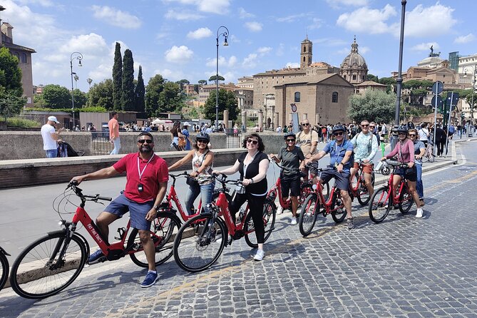 Private Sacred Relics Jubilee Bike Tour - Riding around the Colosseum
