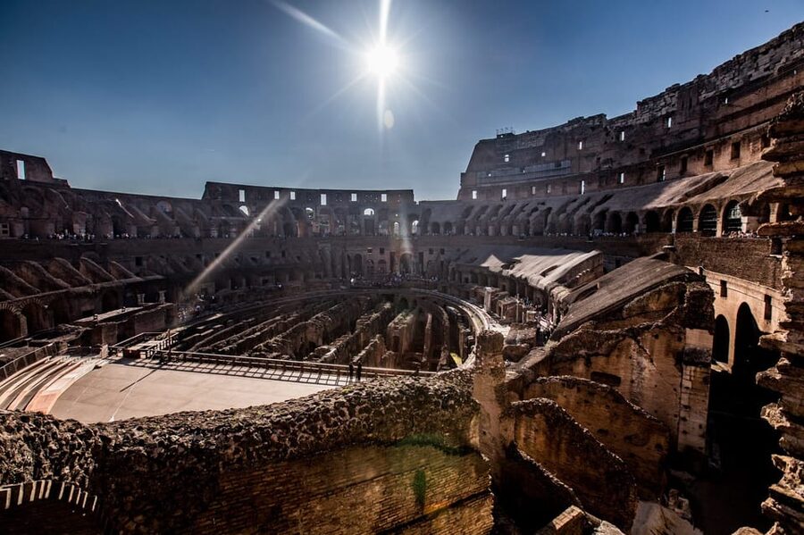 Rome: 1-Hour Fast Colosseum Tour - Walking toward the ancient amphitheater