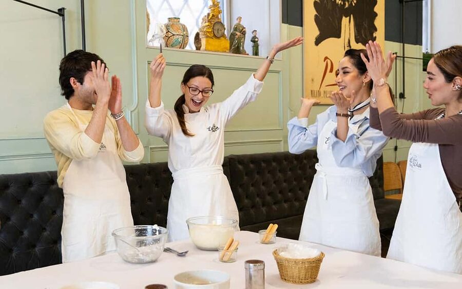Rome: 3-in-1 Fettuccine, Ravioli, and Tiramisu Cooking Class - Sitting down to eat what you made