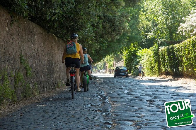 Rome:Appian Way E-bike Tour, Catacombs, Aqueducts & Transfer - Roman ruins along the ancient road