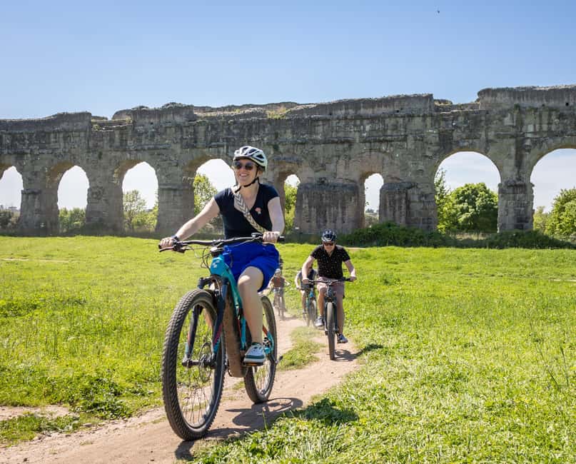 Rome:Appian Way E-bike Tour with Catacombs, Aqueducts & Food - Descending into Rome’s catacombs