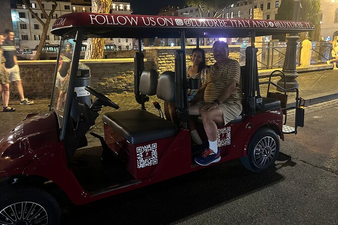 Rome by Night: Golf Cart Tour - Trevi Fountain under evening lights
