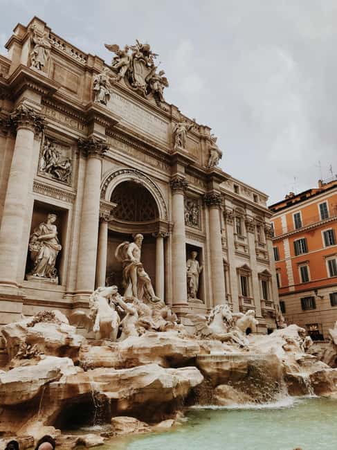Rome: Capuchin Crypt to Pantheon Tour - Walking toward the Trevi Fountain