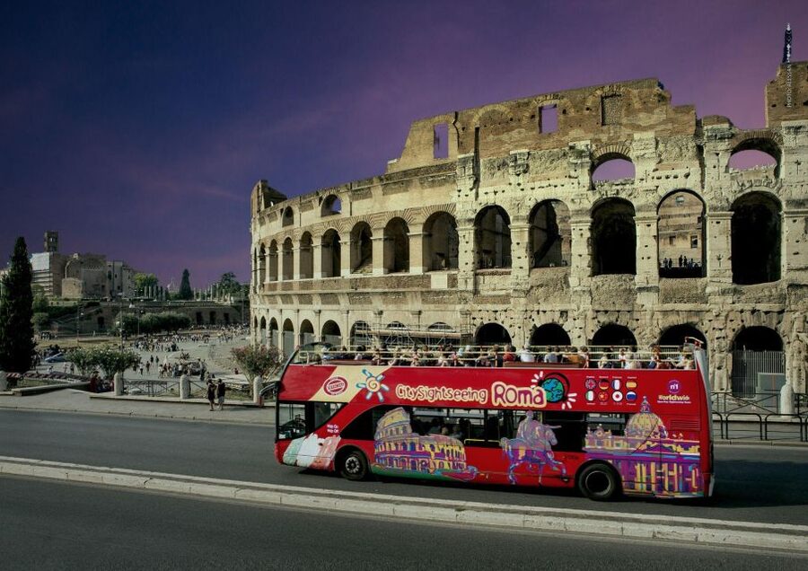 Rome: City Highlights Open-Top Bus Night Tour - Spanish Steps and Piazza Navona in evening light