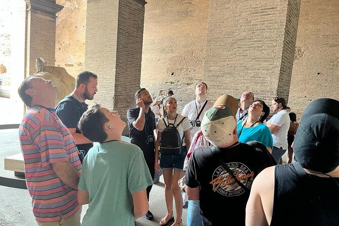 Rome: Colosseum Express Tour with Forum & Palatine Access - Walking Through the Roman Forum