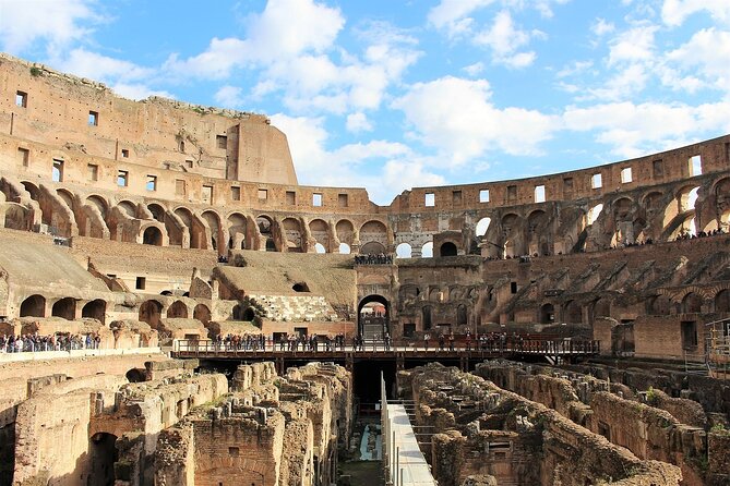 Rome: Colosseum, Forum, & Palatine Hill with Audio Guide - Walking through the Roman Forum