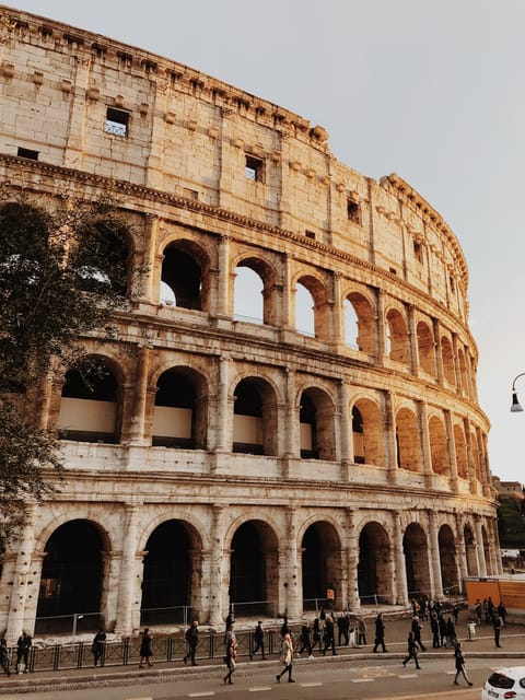 Rome: Colosseum, Forum, Palatine with Breakfast or Aperitif - Walking through the Roman Forum with your own audio guide