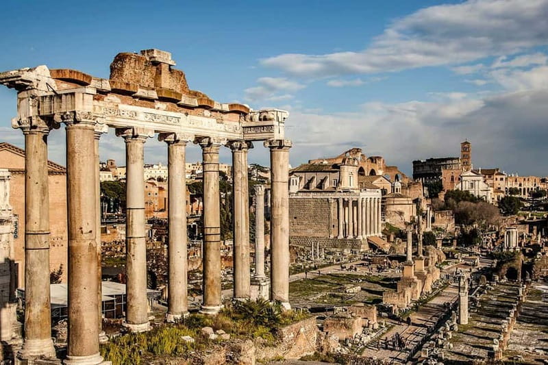 Rome: Colosseum & Forum Small Group Tour with Palatine Hill - Entering the Colosseum’s first and second tiers