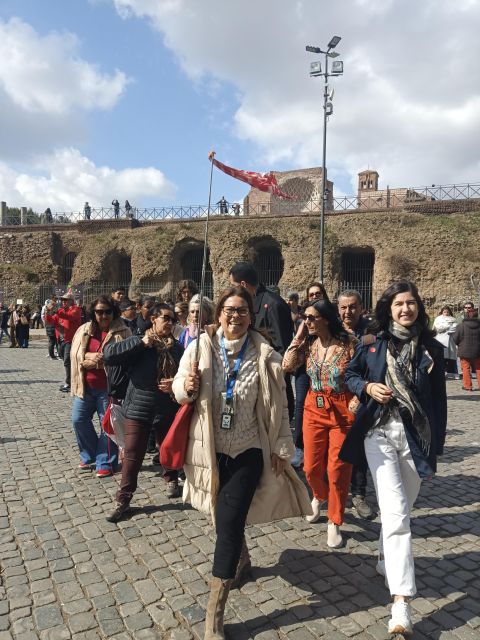Rome: Colosseum, Palatine Hill, & Roman Forum Walking Tour - Entering the Colosseum’s first two levels