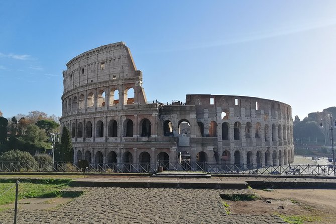 Rome: Colosseum, Roman Forum and Palatine Hill Private Tour - Arches, imperial forums, and the changing city