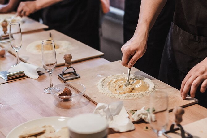 Rome Cooking Class: Make Pasta, Dine & Drink Wine With Local Chef - Rolling fettuccine and shaping ravioli