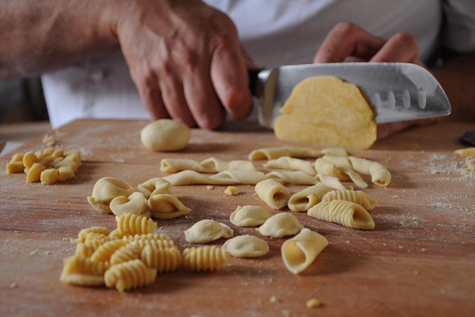 Rome Cooking Class: Make Pizza and Pasta with Wine & Dessert - Making Neapolitan pizza in a wood-fired oven