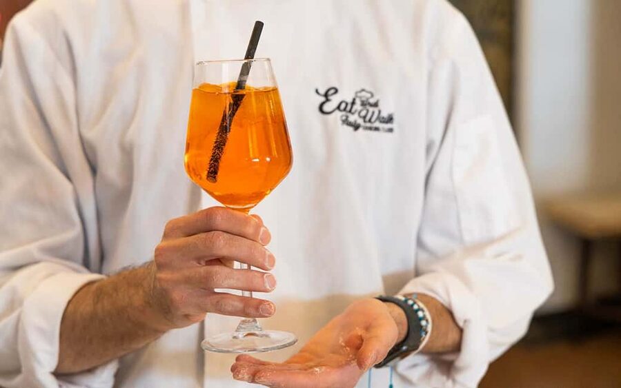 Rome: Enjoy Spritz and Pasta Making in Piazza Navona - Working the dough into two pasta shapes