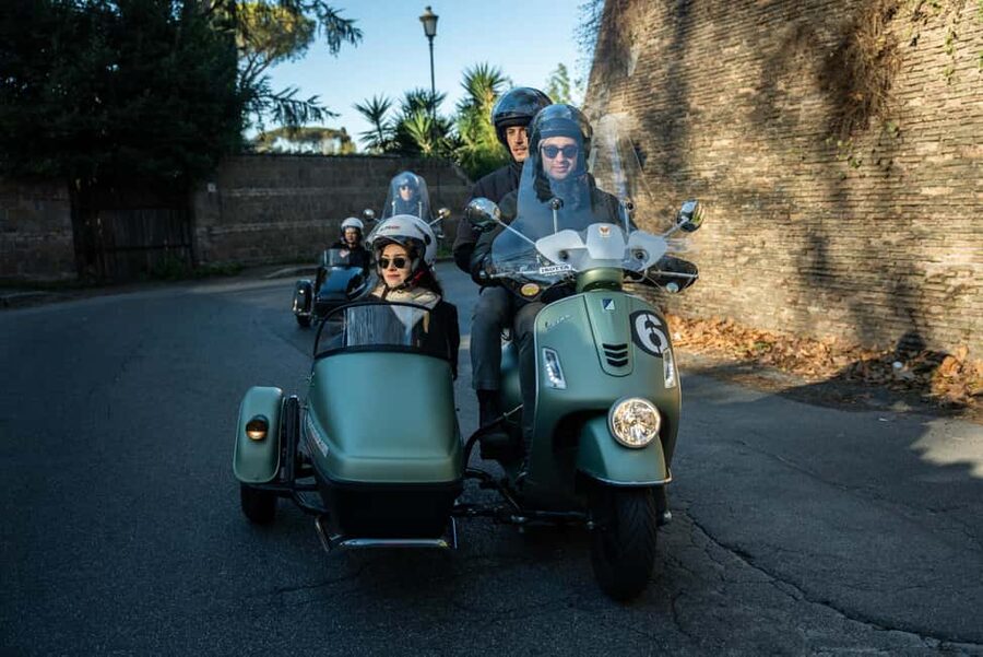Rome: Evening Vespa Sidecar City Tour - The Colosseum at sunset