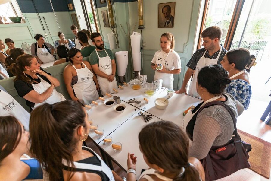 Rome: Fettuccine and Tiramisu Cooking Class with Wine - Sitting down to eat what you made