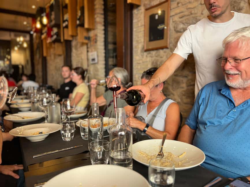 Rome: Food Tour with Unlimited Food and Barolo Wine - The local food shop and the people behind it