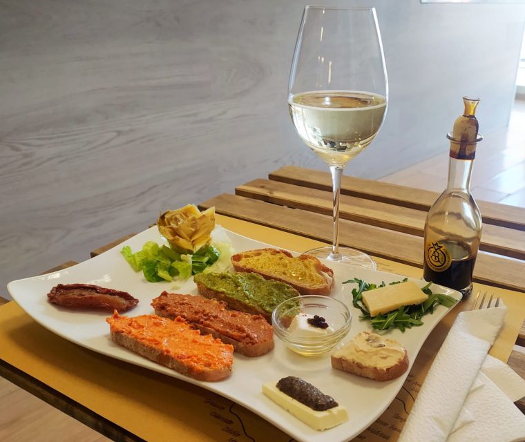 Rome: Food Tour with Unlimited Food and Barolo Wine - Starting at Via Cipro with cheese, balsamic, and Prosecco