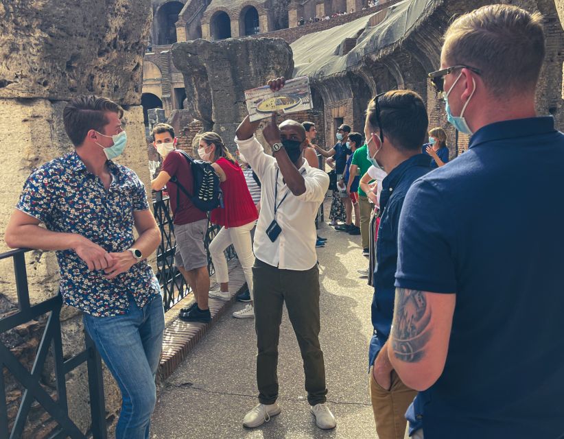 Rome: Guided Group Colosseum & Ancient City Tour - Walking the Via Sacra into the Roman Forum