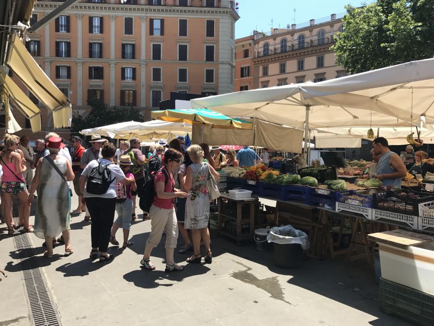 Rome: Guided Walking Tour and River Boat Ride - Trastevere starts the day with food and old Rome