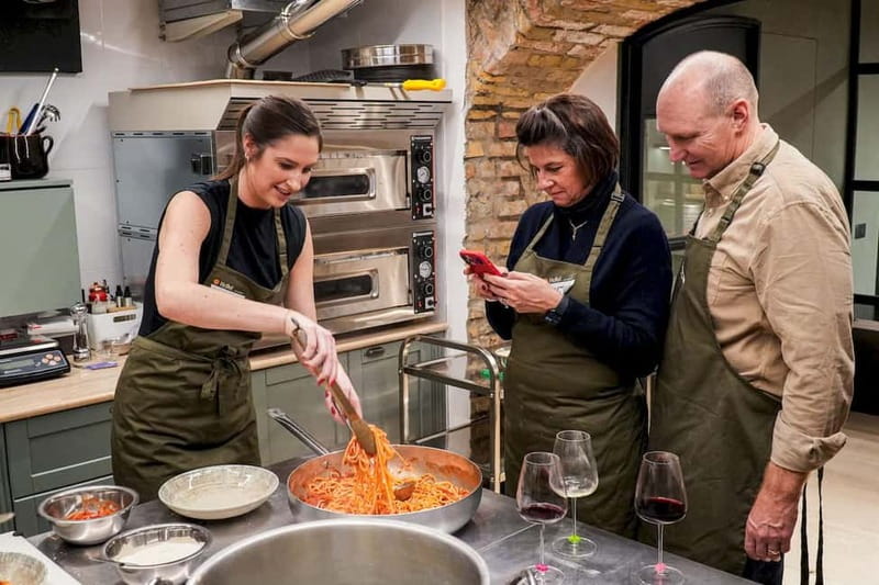 Rome: Hands-On Pasta & Tiramisu Class with Unlimited Wine - The meal, wine, and social side
