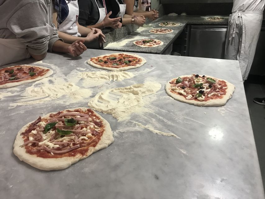 Rome: Hands-On Pizza Making Class near the Vatican with Wine - Kneading, stretching, and shaping the dough