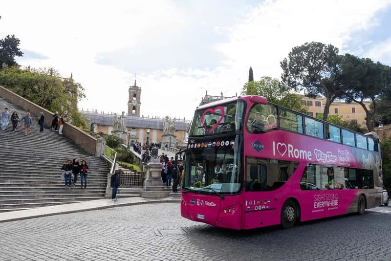 Rome: Hop-on Hop-off Sightseeing Bus Tour with Audioguide - Stop 3 near the Colosseum and Roman Forum