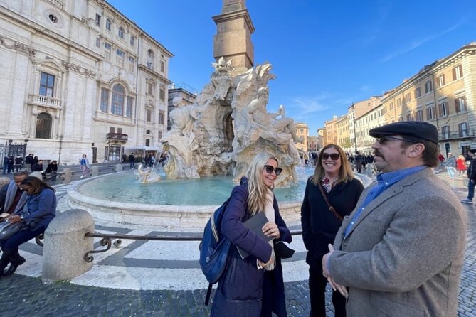 Rome in a Day Group Tour with Vatican Museums and Colosseum - Entering the Colosseum with a guide