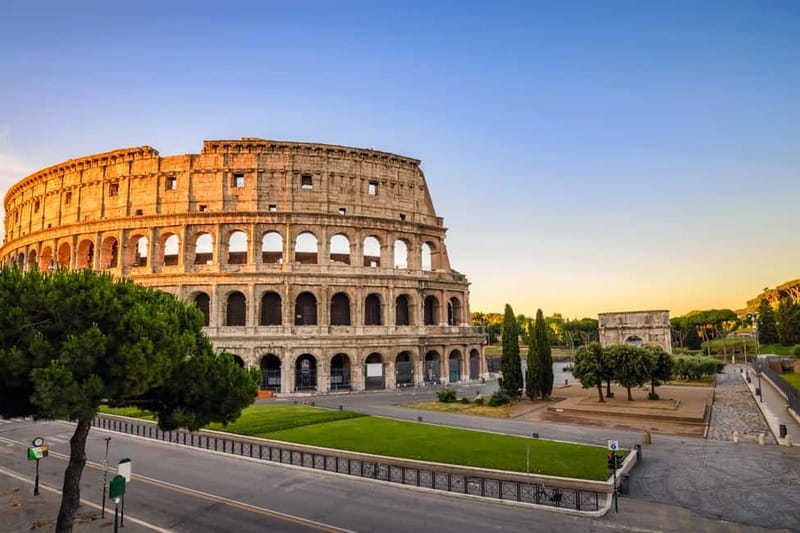 Rome: Mamertine Prison, Colosseum Experience, & Audio Guide - Walking through the Roman Forum