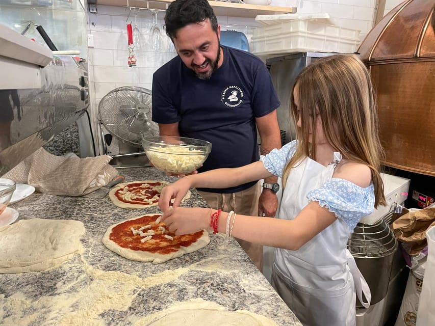 Rome: Neapolitan Pizza Cooking Class in Front of the Vatican - Into the wood-fired oven