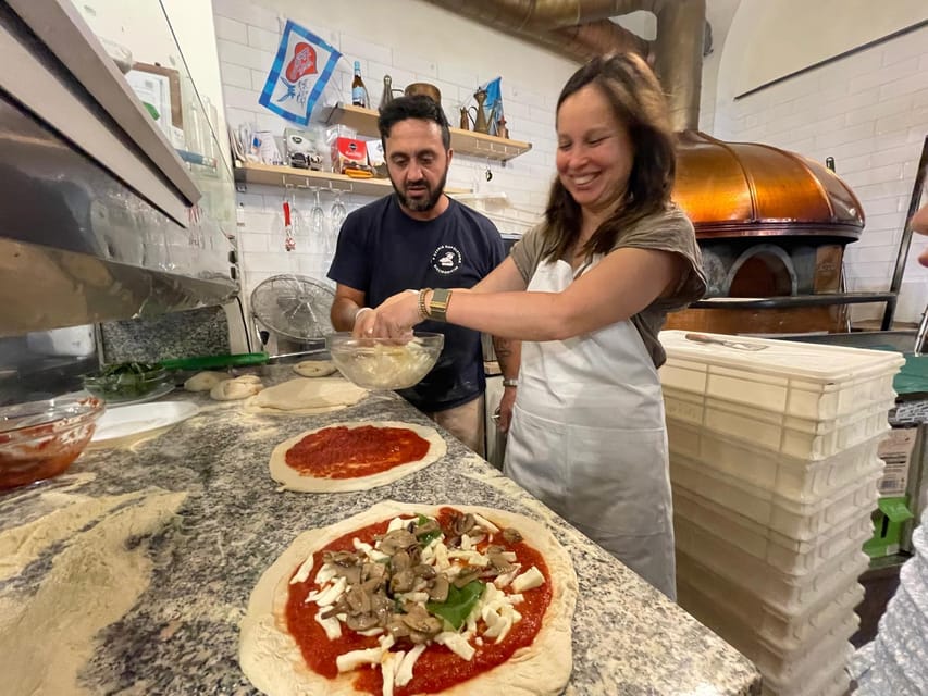 Rome: Neapolitan Pizza Cooking Class in Front of the Vatican - Sitting down to eat your own pizza