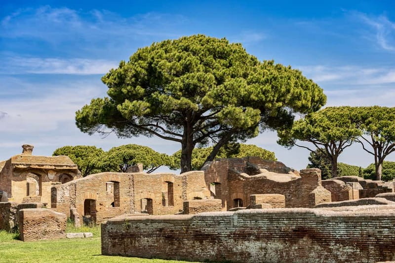 Rome: Ostia Antica Archaeological Park Ticket & Audio App - The amphitheater and its theatrical stone masks