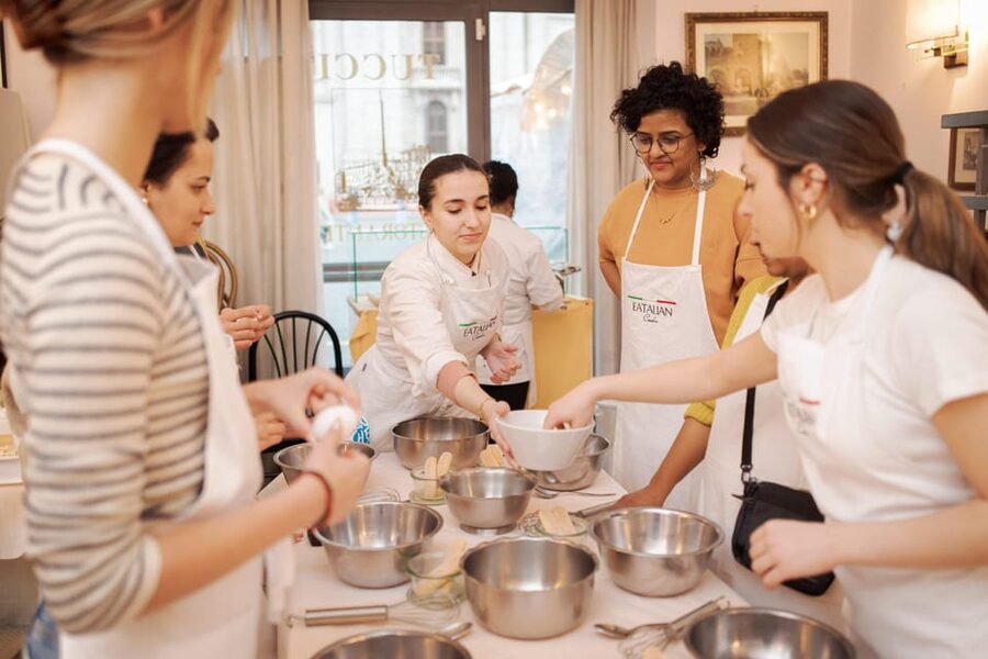 Rome: Pasta and Tiramisu Cooking Class in Piazza Navona - Rolling the dough into fresh fettuccine