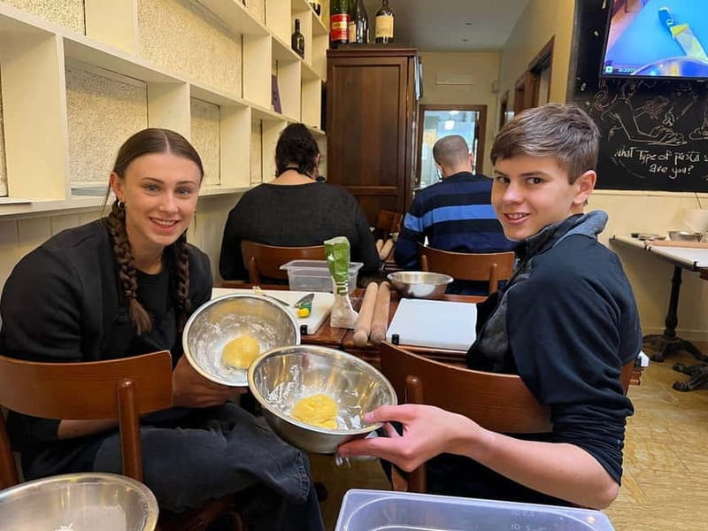 Rome: Pasta Cooking Class with Wine, Coffee, and Limoncello - Tagliatelle, fettuccine, and ravioli on one table