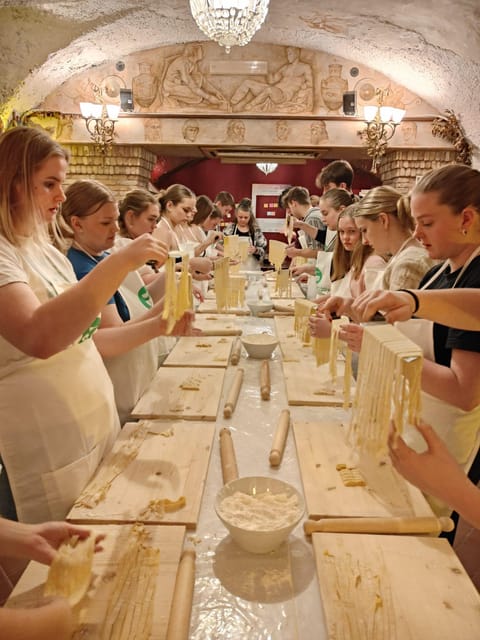Rome: Pasta & Tiramisu Cooking Class near the Spanish Steps - Turning flour and egg into fettuccine