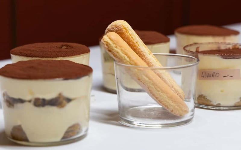 Rome: Pizza and Tiramisù Cooking Class with Glass of Wine - Sitting down to eat what you prepared