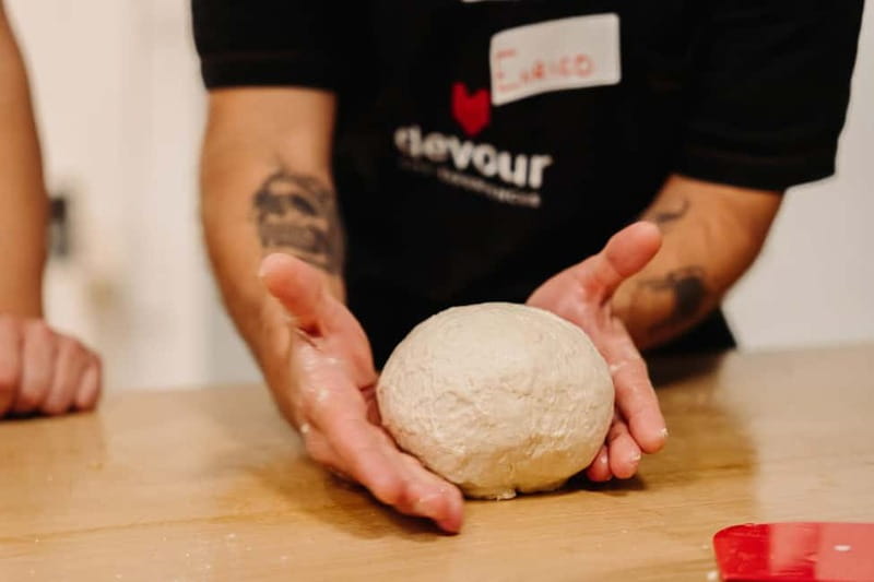 Rome: Pizza Making Class with Gelato & Drinks Included - Stretching, topping, and baking your own pizza
