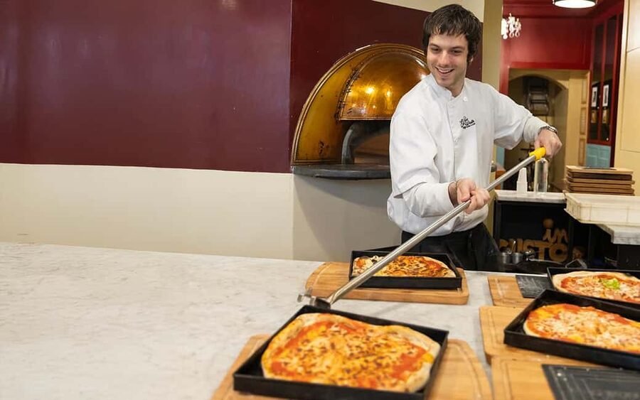 Rome: Pizza & Tiramisu Making Class with Wine & Limoncello - Kneading, stretching, and topping your Roman pizza